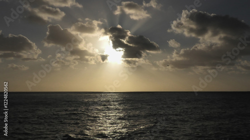 Sunlight shrouded by clouds photo