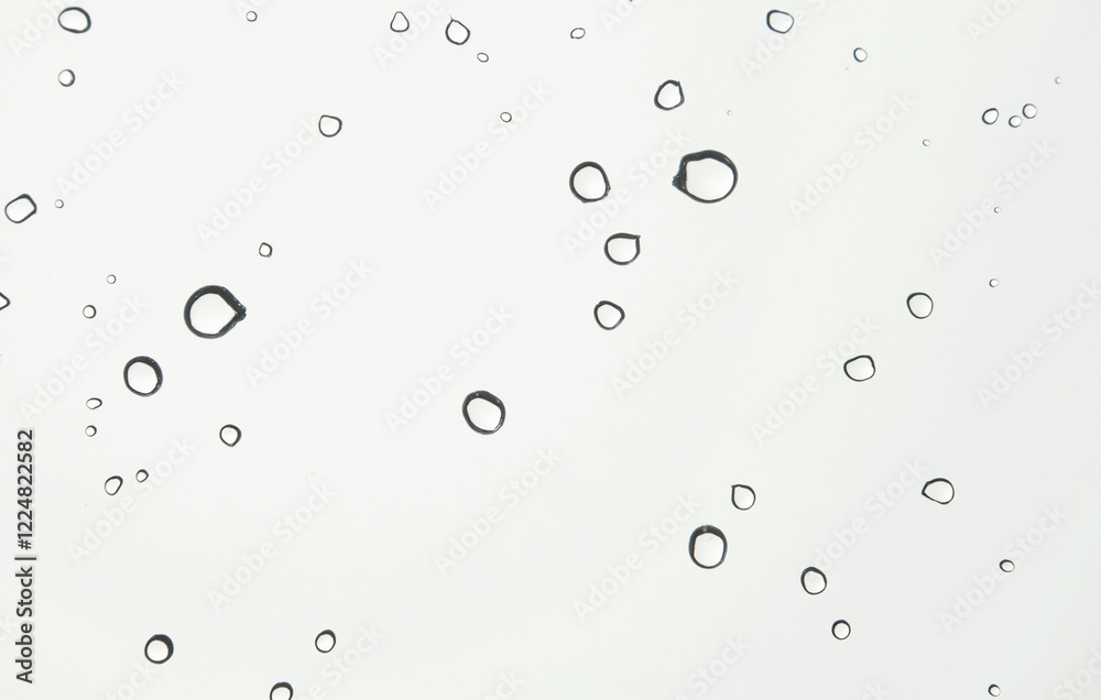 Collection of transparent liquid droplets in various sizes Collection of transparent liquid droplets in various sizes