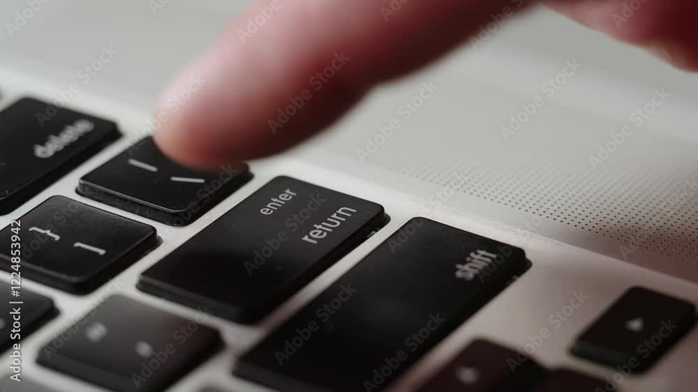 Close up male's finger aggressively presses the enter key several times, deadline comes