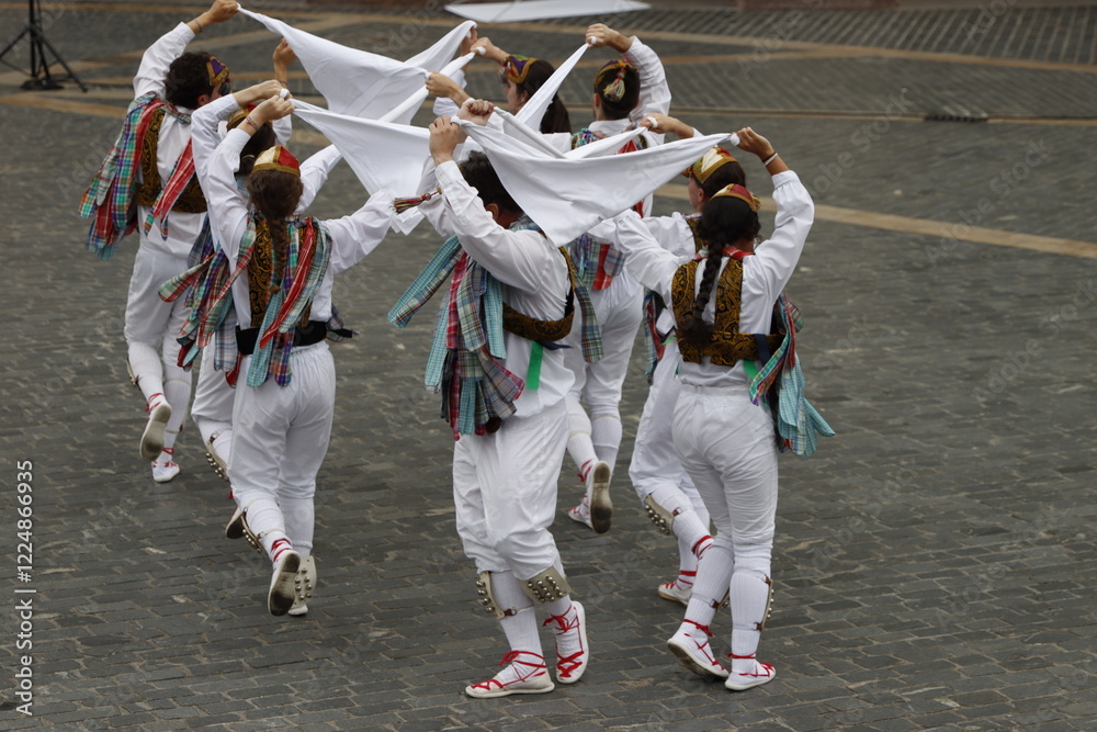 Basque folk dance exhibition in an outdoor festival Basque folk dance exhibition in an outdoor festival