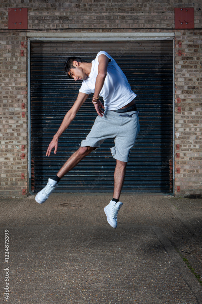 Defying Gravity. A series of images of dancers creating abstract shapes while frozen in midair in an urban environment. Defying Gravity. A series of images of dancers creating abstract shapes while frozen in midair in an urban environment.