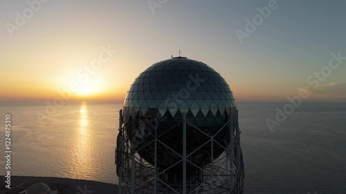 Unusual tower close-up against the sea
