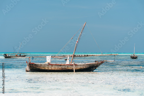 Zanzibar dhows, traditional boats, at anchor photo