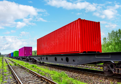 BELARUS, MINSK - MARCH 24, 2020: Cargo containers HAMBUR SUD transportation on freight train by railway. Intermodal Container On Train Car. Rail Freight Shipping Logistics Concept. photo