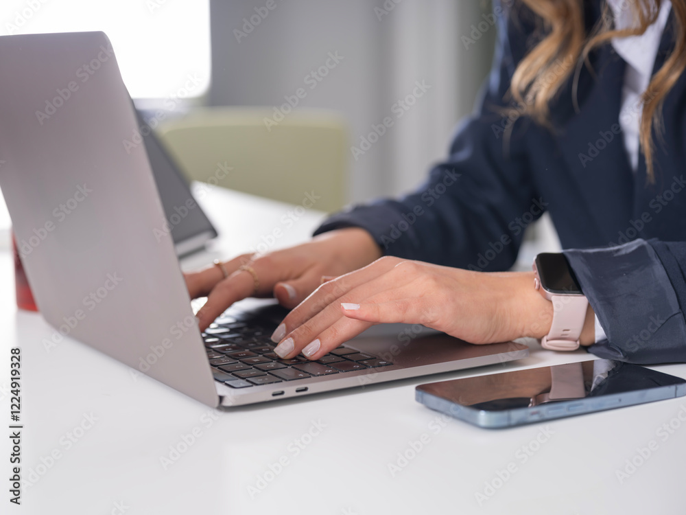 Woman hand typing on laptop, close up image of business woman working at office desk woman hand typing on laptop computer, surfing internet, writing email, online working, freelancer at home. Woman hand typing on laptop, close up image of business woman working at office desk woman hand typing on laptop computer, surfing internet, writing email, online working, freelancer at home.