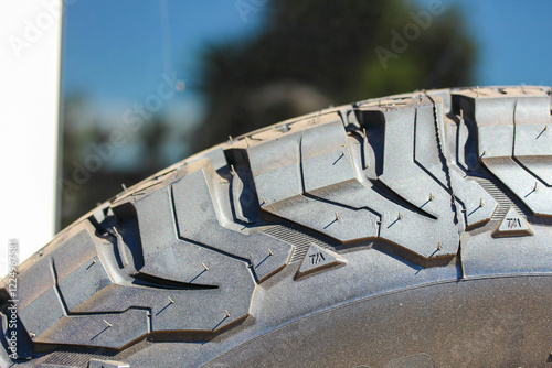 Obraz na płótnie Profile view of a new off-road tire w salonie