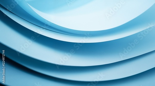 Abstract blue paper curves with soft shadows. Ideal for modern design and creative backgrounds.