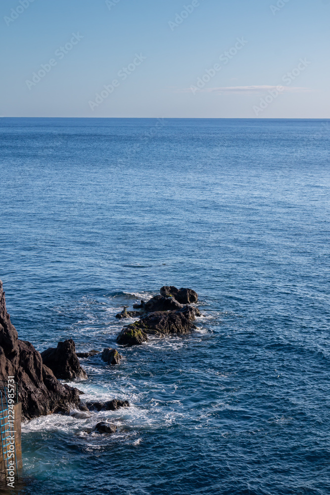 Volcanic rocks is Atlantic ocean, Ponta do Sol, Madeira Volcanic rocks is Atlantic ocean, Ponta do Sol, Madeira
