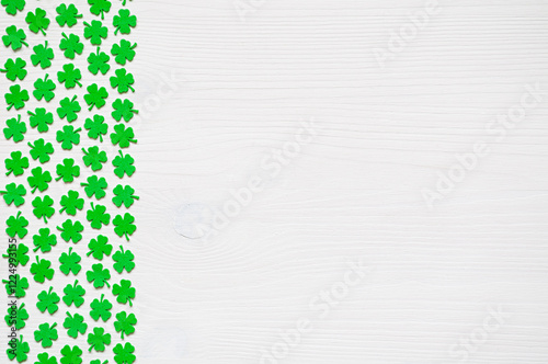 St Patricks Day background with green quatrefoils photo