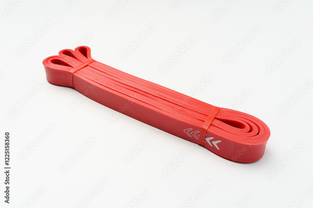 fitness elastic band. Woman showing a blue rubber band. Sport and healthy active lifestyle concept. A set of colorful elastic fitness band. fitness elastic band. Woman showing a blue rubber band. Sport and healthy active lifestyle concept. A set of colorful elastic fitness band.