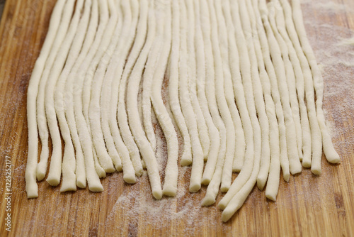 Pici, Siena's specialty, thick handmade pasta in Italy. photo