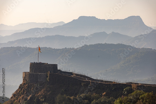 Pratapgad fort and Madhu Makrandgad seen along with various mountains of western ghats, Maharashtra