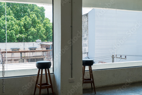 Photography Empty chair in Korean restaurant or minimal cafe style with a wonderful view of city in seoul korea