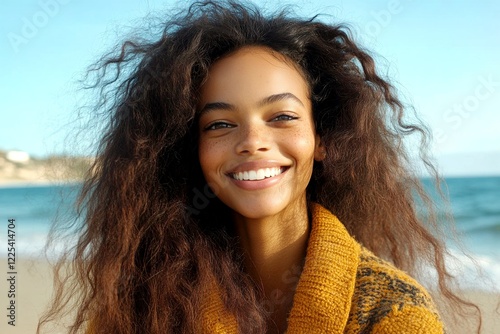 Long hairdo - beach waves hair. Attractive smiling mixed-race girl - for ads, marketing material and social apps use. Commercial digital ads creative. Colored hair models glamour. photo