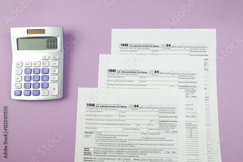 1040 tax form 2024 . Tax return forms 1040 with office supplies and dollar bills. Time to pay taxes.