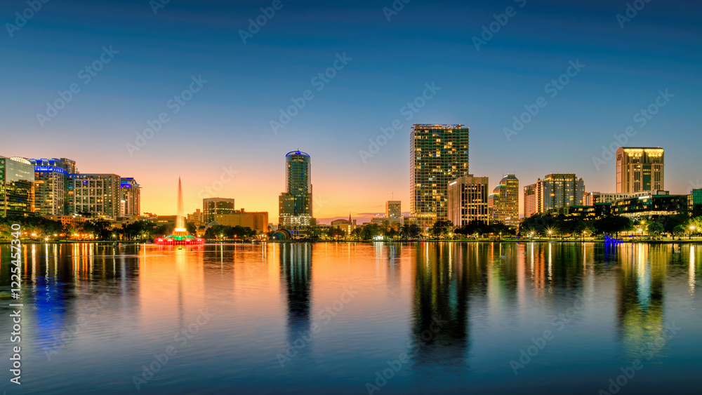 Orlando city skyline at sunset. Panoramic view of Orlando in Lake Eola Park, Florida, USA Orlando city skyline at sunset. Panoramic view of Orlando in Lake Eola Park, Florida, USA