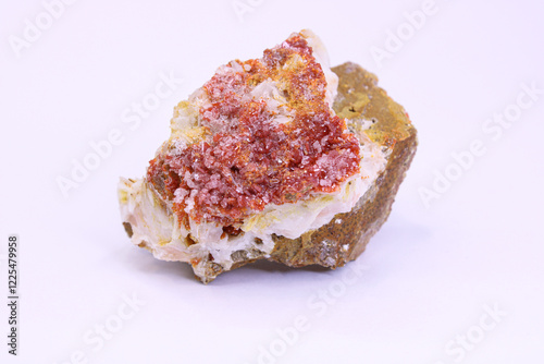 Vanadinite crystals on barite,  white background