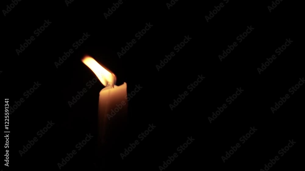 Lone Candle Flame Illuminating the Darkness Lone Candle Flame Illuminating the Darkness