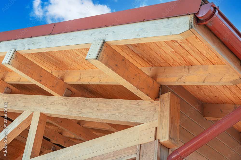 Construction of a wooden roof of a frame house.