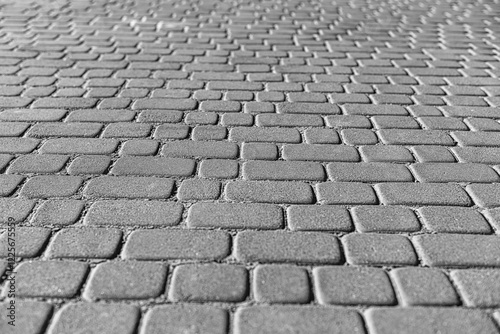 Obraz na płótnie Concrete road paving stones abstract background. w salonie