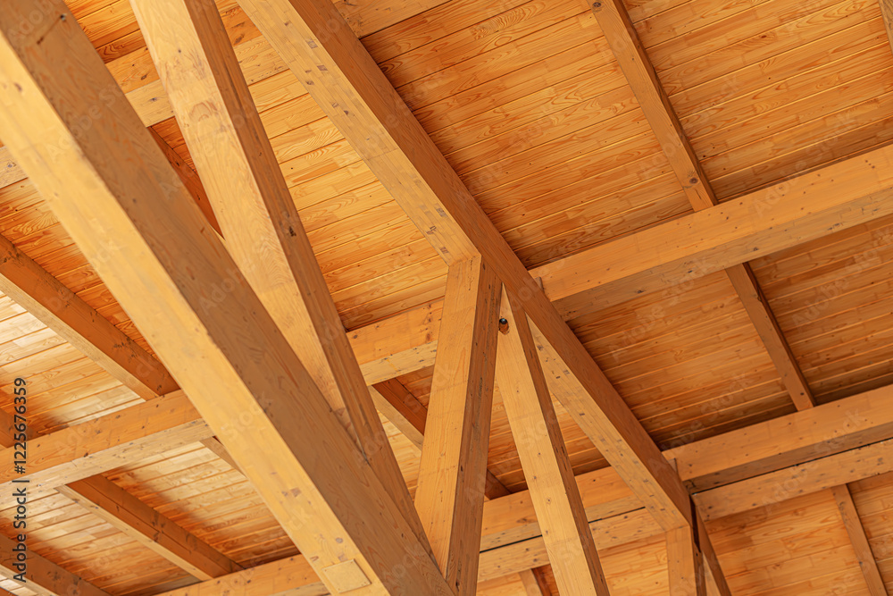 Construction of a wooden roof of a frame house.