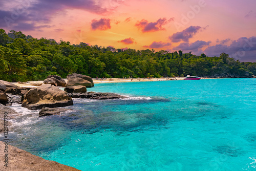 Landscape panorama tourist speedboat turquoise lagoon beach Similand Island sunset Phang nga, Thailand. photo