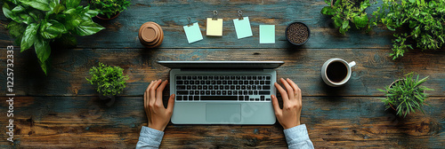 A minimalist workspace with hands typing on a keyboard, sticky notes being added to a board, and coffee cups being set down, photo