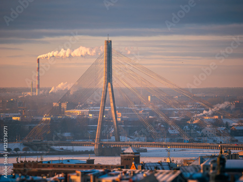Rīga city center, downtown. View on cable suspension bringe (Vanšu tilts) over Daugava river in winter.