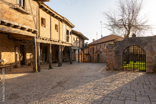 Arcades and old houses, typical medieval architecture in Calatanazor, Soria, Spain photo