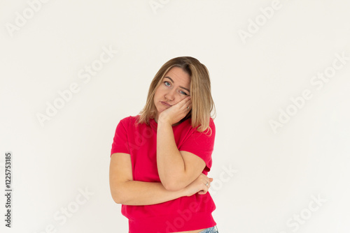 Image of sad casual girl, woman sulking and frowning disappointed, standing upset and distressed against white background