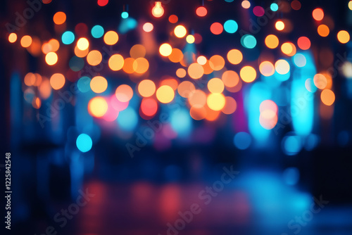 Fully blurred photo of a party with colorful bokeh light dots