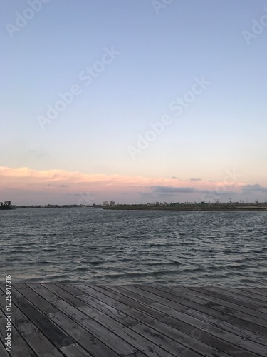 peaceful sunser sky and water photo