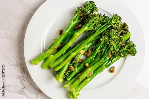 Top view of a plate with broccolini photo