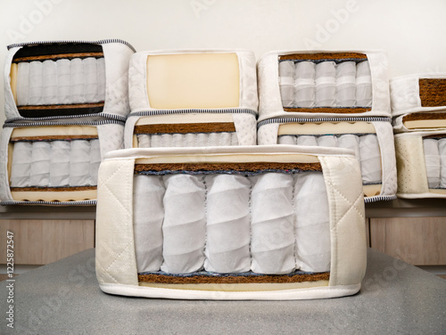Mattress filler. Independent spring blocks and modern fillers made of coconut coir, algae, cotton in a cotton cover. Manufacture and manufacture of mattresses.