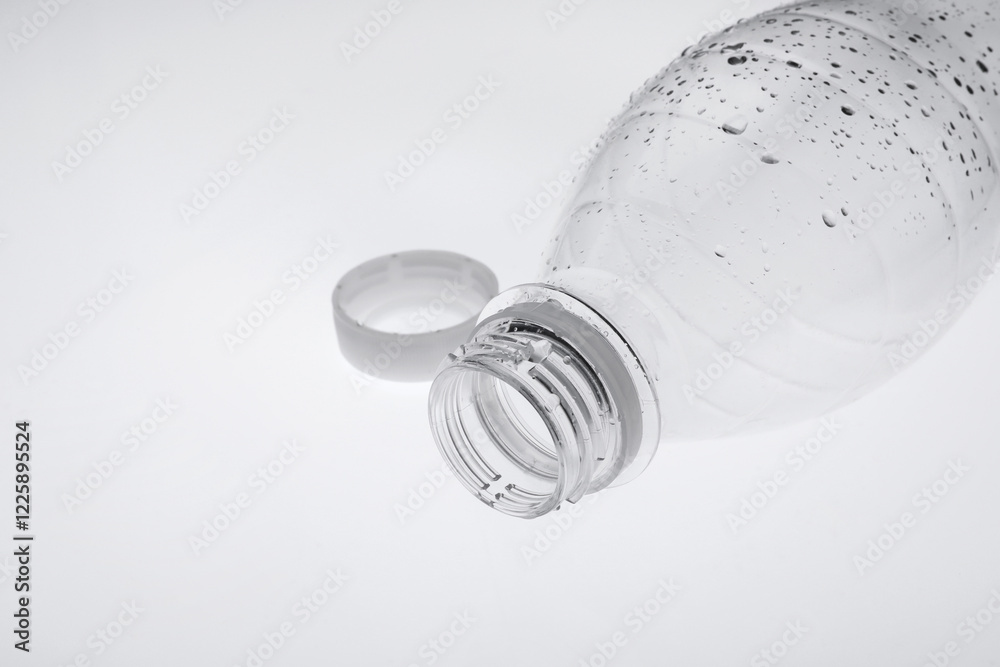 Empty plastic bottle on white background, closeup Empty plastic bottle on white background, closeup