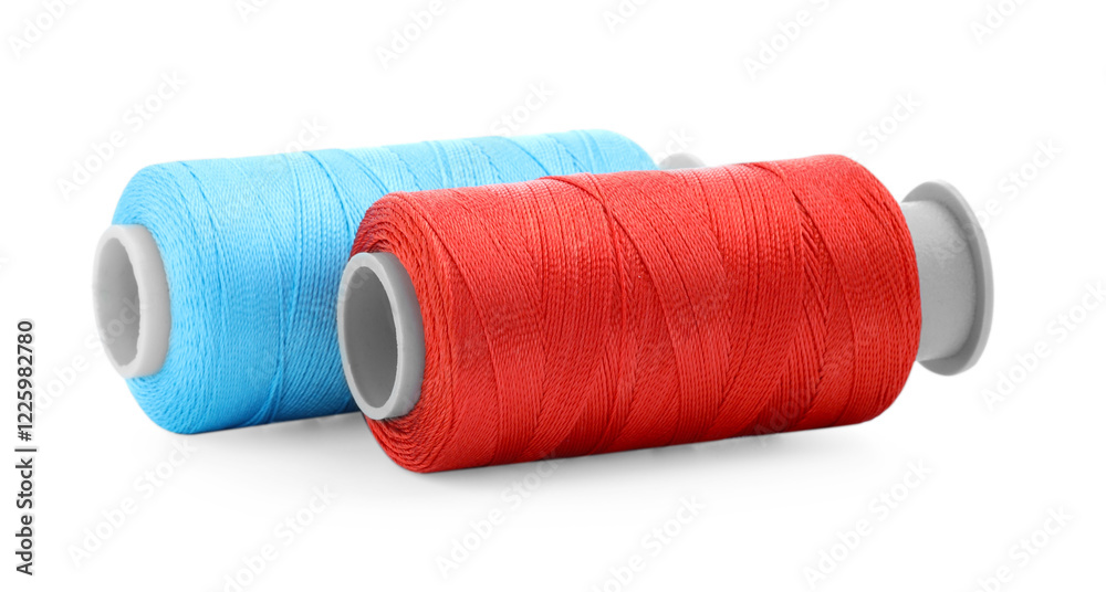 Spools of bright sewing threads isolated on white Spools of bright sewing threads isolated on white