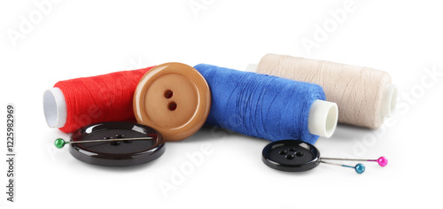 Canvastavla Threads and other sewing supplies isolated on white