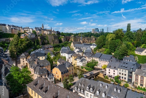 A breathtaking panoramic cityscape view of Luxembourg City, Luxembourg, highlighting its historic architecture, scenic parks, and the stunning natural countryside surrounding the city.