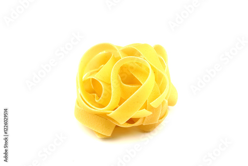 Raw tagliatelle pasta isolated on white background with full depth of field. Top view. Flat lay
