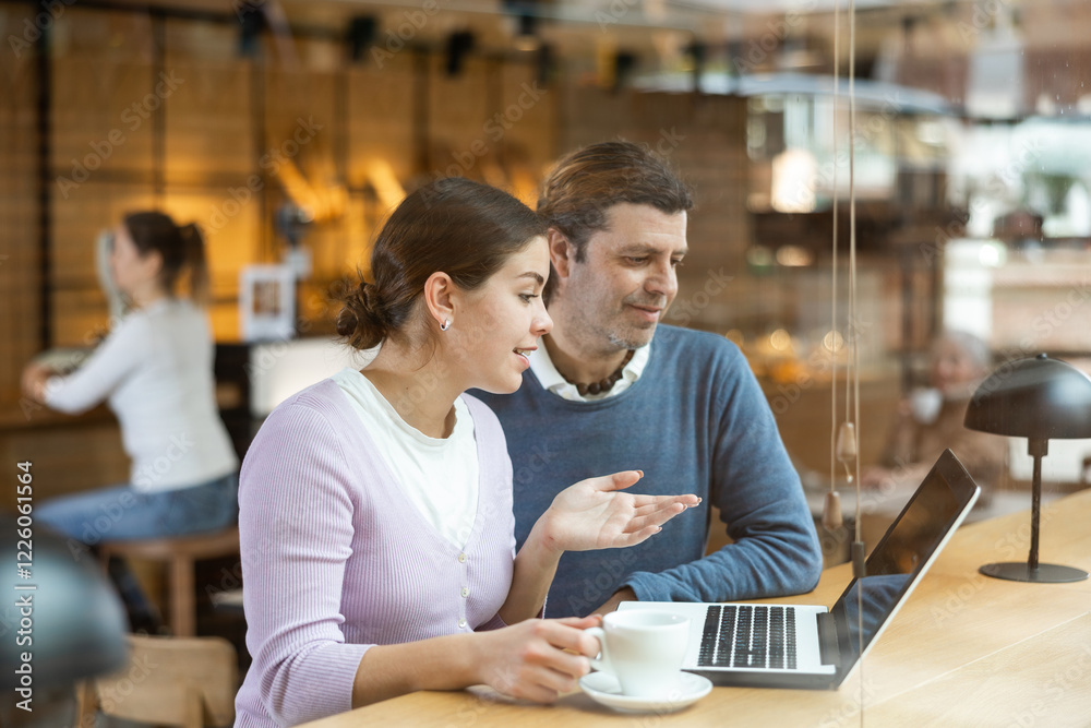 custom made wallpaper toronto digitalConfident male and female cafe customer enjoying coffee while working on laptop
