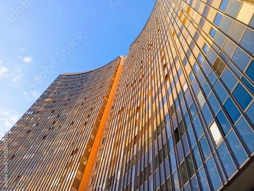 Huge glass building at sunset