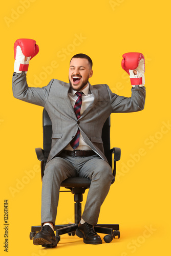 Excited businessman in boxi...
