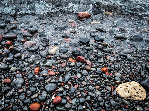 pebble beach and wave on the black sea, natural background