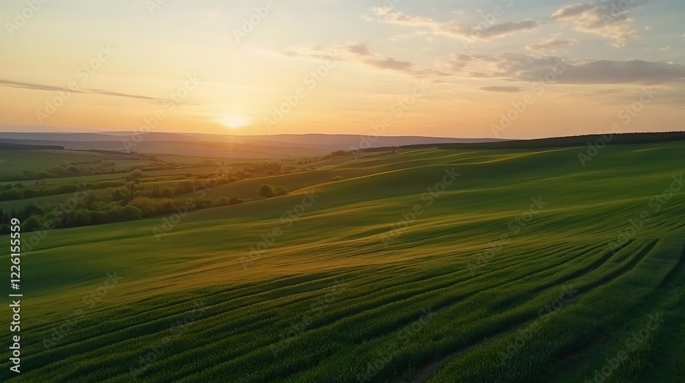 Serene Sunset over Rolling Green Fields Serene Sunset over Rolling Green Fields
