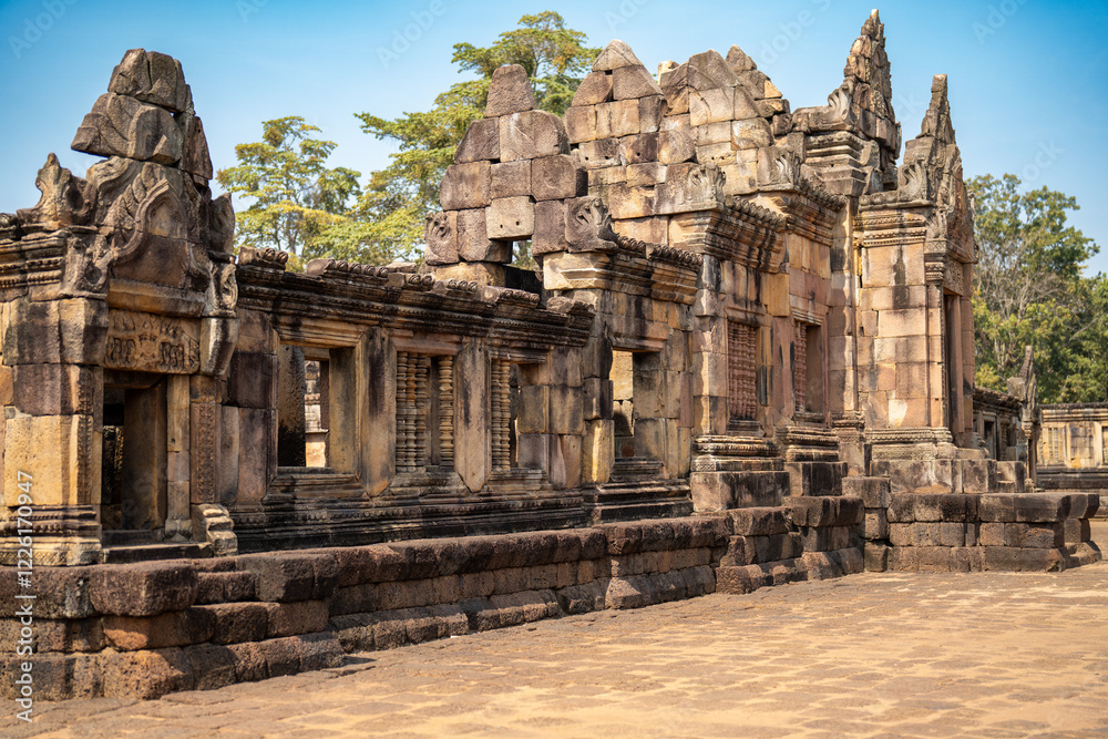 Lintel of the main castle, made of sandstone, carved with images in an ancient site, Ancient architecture Sand Stone Castle in Buriram province, Thailand, Prasat Muang Tam Khmere architectural site. Lintel of the main castle, made of sandstone, carved with images in an ancient site, Ancient architecture Sand Stone Castle in Buriram province, Thailand, Prasat Muang Tam Khmere architectural site.