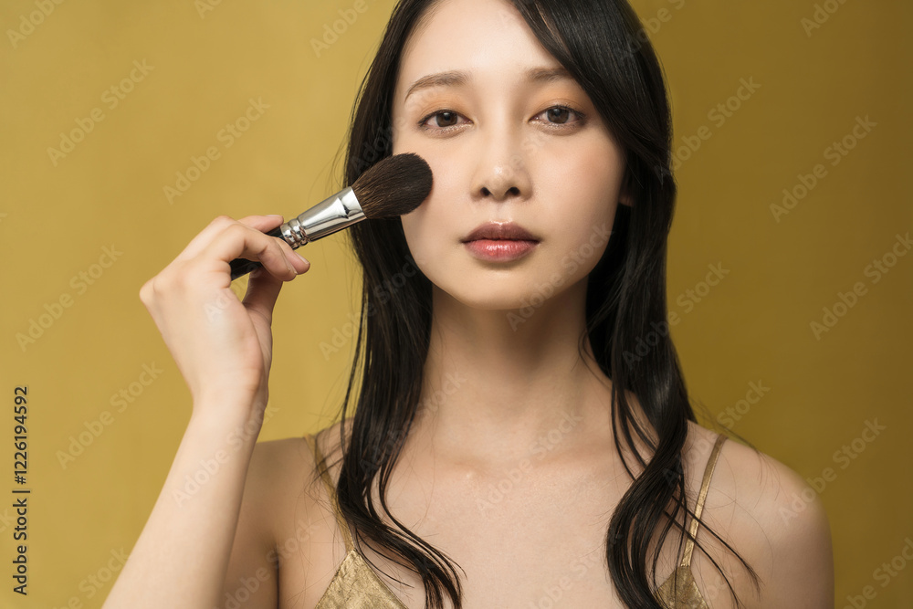 Obraz premium 艶感のあるメイクする女性