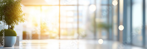 Blurred background of a modern coworking space showcasing sleek black furniture and abundant natural light. ideal for productivity and collaboration in a stylish environment. photo