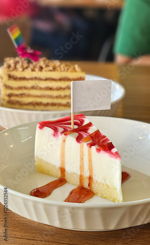 Cheesecake with syrup serving with mini flag in the coffee shop