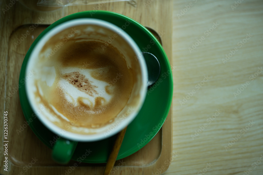 Empty green ceramic cup coffee after drink. Top view Empty green ceramic cup coffee after drink. Top view