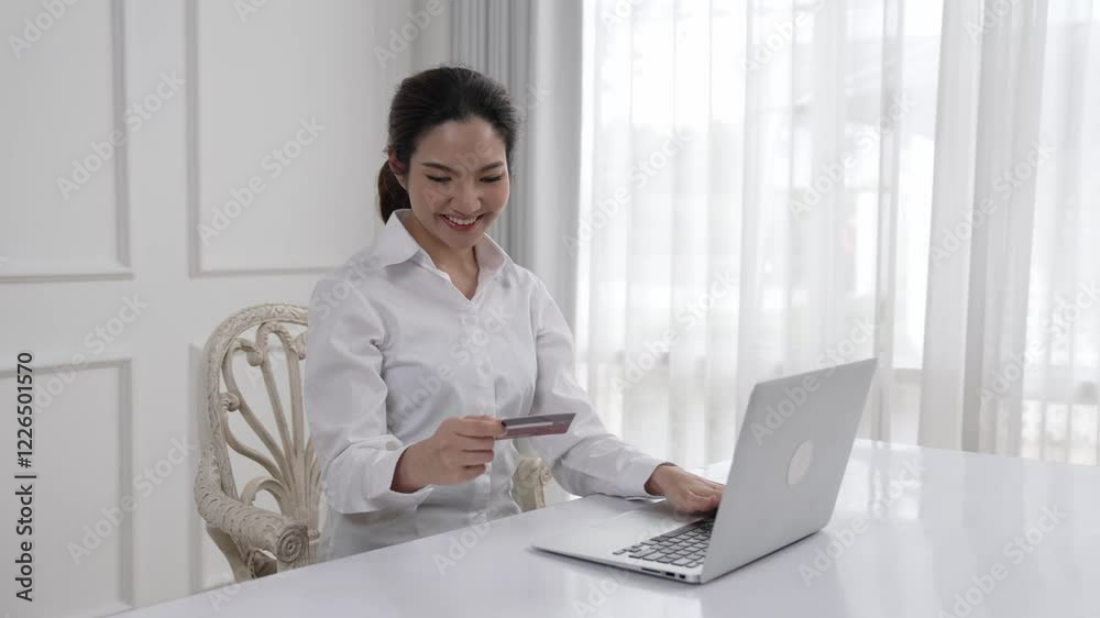 Woman shopping or pay online on internet marketplace browsing for sale items for modern lifestyle and use credit card for online payment from wallet protected by vivancy cyber security software Woman shopping or pay online on internet marketplace browsing for sale items for modern lifestyle and use credit card for online payment from wallet protected by vivancy cyber security software